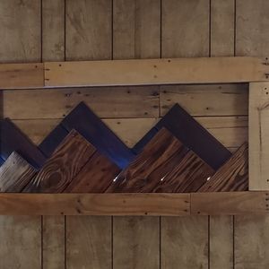 Backlit mountain range piece